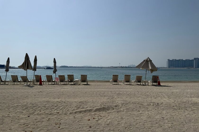 Buy a property - Emaar Beachfront, UAE - image 9