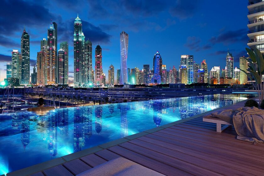 Buy a property - Emaar Beachfront, UAE - image 26