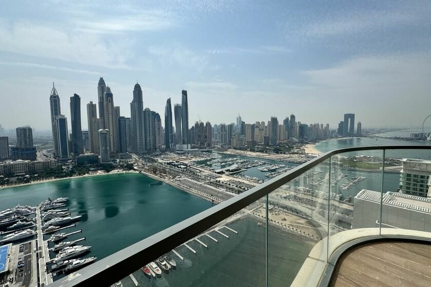 Buy a property - Emaar Beachfront, UAE - image 28