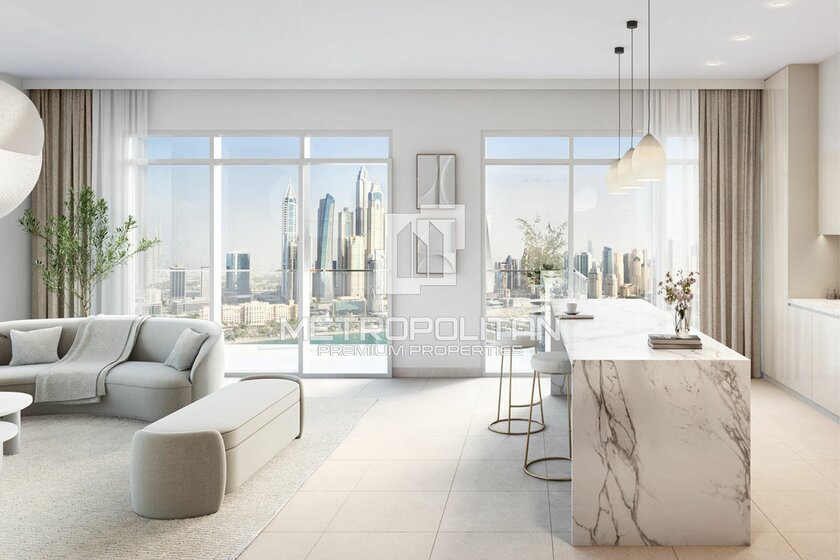 Buy a property - Emaar Beachfront, UAE - image 12