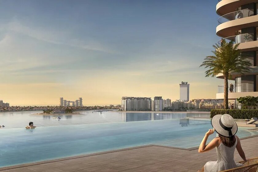 Buy a property - Emaar Beachfront, UAE - image 35