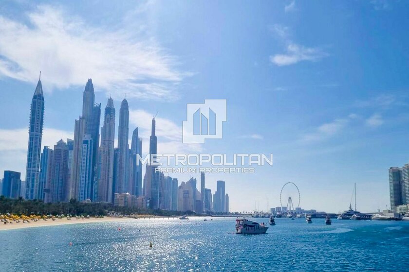 Compre una propiedad - 2 habitaciones - Emaar Beachfront, EAU — imagen 12