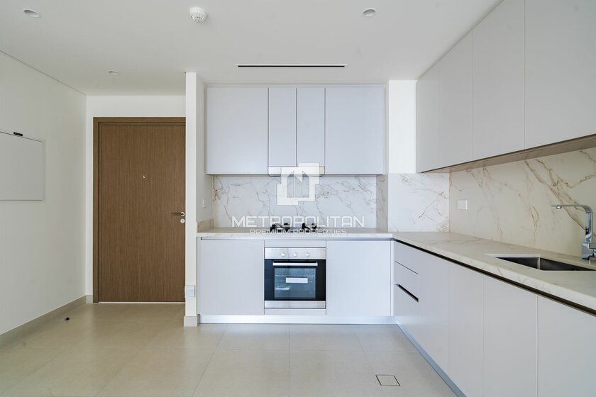 Снять 8 апартаментов - 1 комнатные - Emaar Beachfront, ОАЭ - изображение 28