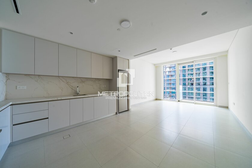 Снять 8 апартаментов - 1 комнатные - Emaar Beachfront, ОАЭ - изображение 27