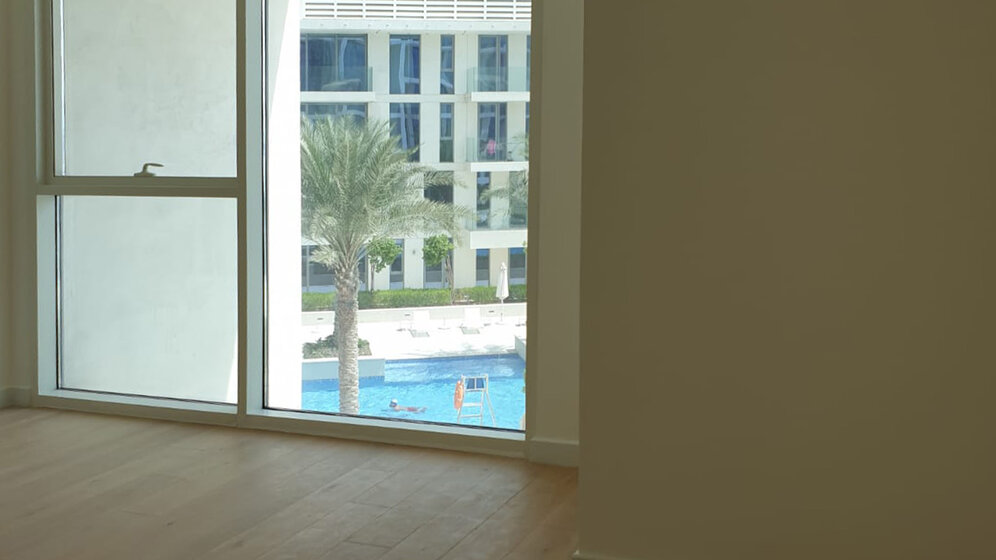 Купить однокомнатную недвижимость в Абу-Даби - изображение 11